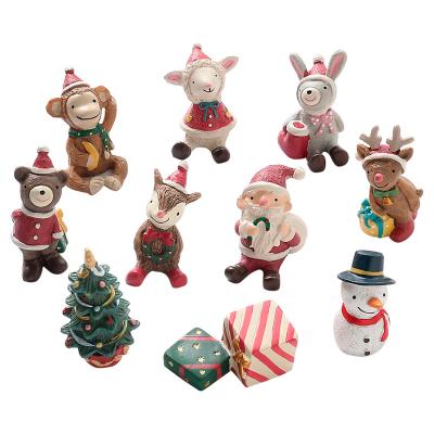 China Europe Cartoon Mini Christmas Ornaments Family Creative Home Decoration Gifts Small Resin Animal Ornaments For 2022 for sale