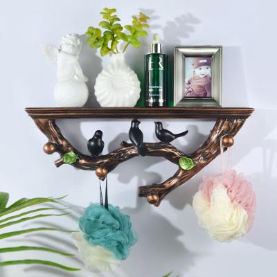 China Eclectic European-style Creative Living Room Rack Hook Opens Resin Wall Hanging Wall Decoration Shelf Wall Decor for sale