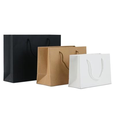 China Biodegrable / compostable bulk production cheap custom shopping paper bag for sale