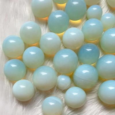 China Europe 20mm Small Opalite Opal Ball Pocket Stone Opalite Sphere for sale