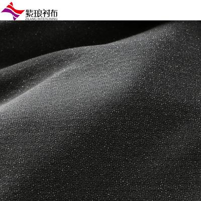 China Circular Knitted 100% Adhesive 100D Polyester Stretch Interlining Woven Fusible Interlinings for sale