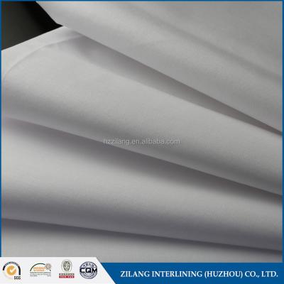 China 100% Adhesive Cotton Fusible Interlining Interlining Manufacturer for sale