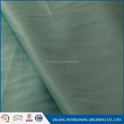 China 100%Polyester Adhesive Woven Fusible Interlining Fabric for sale