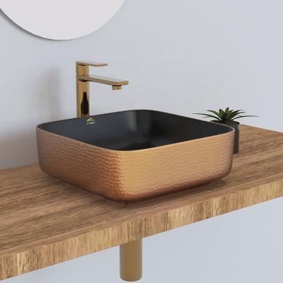 China Modern Popular Design Rose Gold Ceramic Wash Basin Color Sink Bathroom Countertop Sink for sale