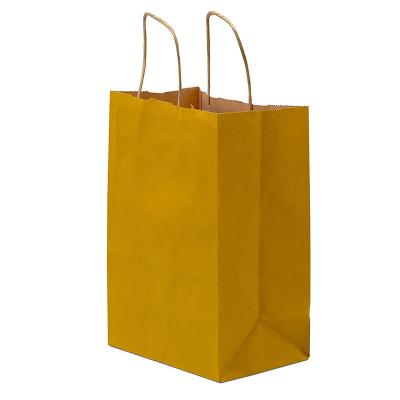 China Wholesale Custom Cheap Recycled Materials Brown Logo Yellow Custom Printed Shopping Gift Wrapping Paper Washable Bag for sale