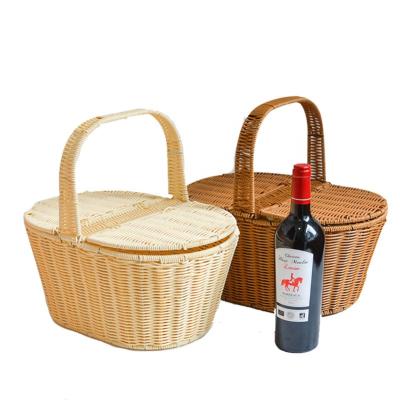 China Vintage Style Picnic Food Baskets Woven Rattan Large Size Sustainable Plastic Storage Basket With Handle for sale