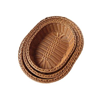 China Sustainable Handmade Plastic PP Rattan Woven Storage Baskets Bread Fruit Vegetable Baskets for sale