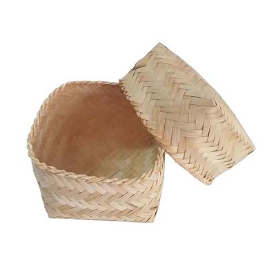 China Viable Huangtu Bamboo Snacks Storage Gift Boxes Basket With Lid Woven Basket Desktop Baskets for sale