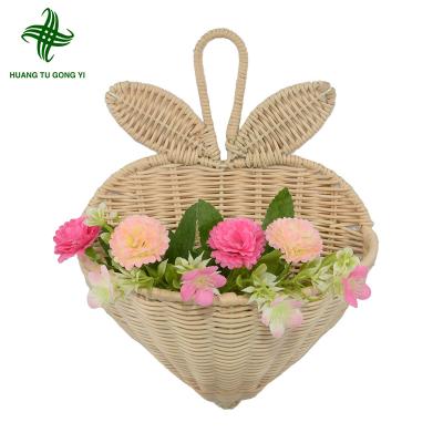 China Sustainably Handwoven Mini Rattan Wall Hanging Baskets For Storage&decoration for sale