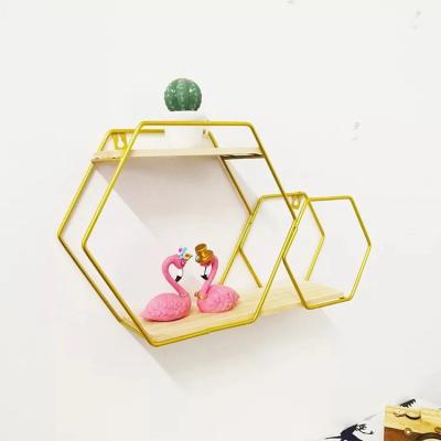 China Home Furniture Hexagon Metal Shelf Geometric Wall Shelf Wall Mounted Floating Display Stands for sale