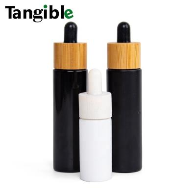 China Wholesale Cosmetic 5ml Matte Frosted Glass Dropper Bottle with Bamboo Lid for Collagen SerumOlive Oil Skin Care Packaging for sale