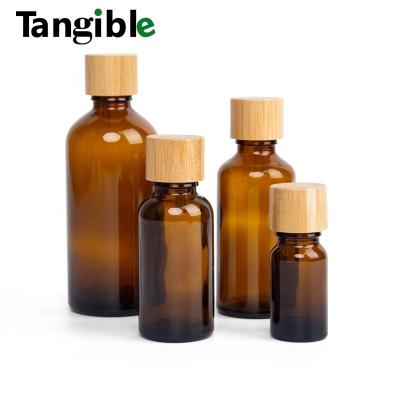 China Essential Oil Cosmetic Paper Matte Black Serum Tube 10ml 15ml 20ml 30ml 50ml 100ml Glass Dropper Bottle 5ml With Bamboo Cap for sale