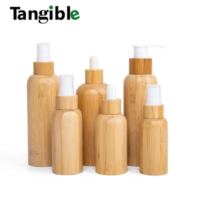 China 1oz 2oz 30ml 50ml 60ml 100ml Eco-friendly Cosmetic Matte Black Glass Dropper Bottle Essential Bottle With Lid Bamboo Top for sale