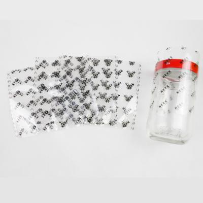 China Custom Size Heat Sensitive Heat Shrink Wrap Strips Perforated Plastic Sealed For Bottle Necks Or Cap Seal for sale