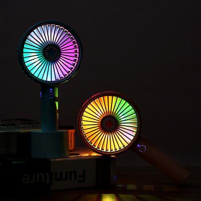 China 2022 Mini Fan With Phone Holder 7 Color Night Light Rechargeable Oem Aroma Desk Handy Custom Air Conditioner Cooler Fan Hot Sale for sale