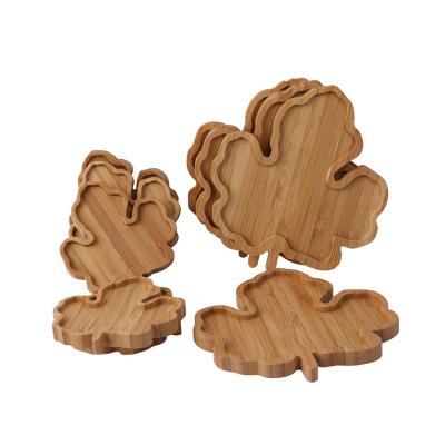 China Sustainable Bamboo Coaster Leaf Shaped Design Fruit Wooden Snack Serving Tray Plate Appetizer Sect for sale