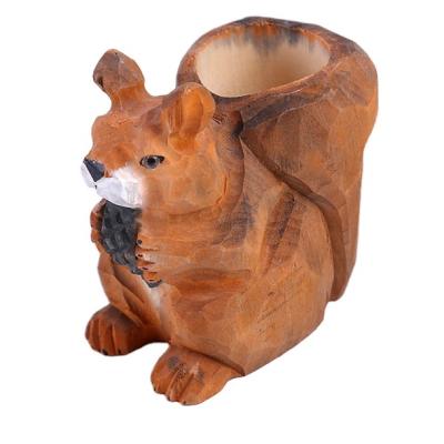 China Minimalist Customized Crafts Pen Holder Wood Carving Funny Ornaments Handmade Creative Desktop Storage Gifts For Office for sale