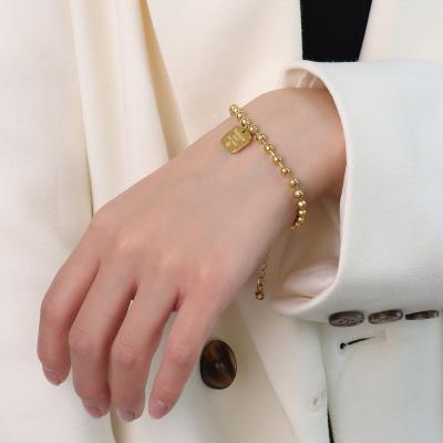 China New INS retro light brand letter square stainless steel bracelets CLASSIC luxury simple gold plated geometric steel ball bracelet 18K for sale