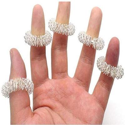 China Mini body acupressure sujok finger massage ring spring fingers acupressure massage rings for sale