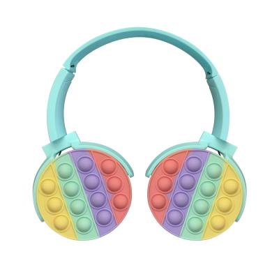 China 12m Bluetooth Wireless Headphones Silicone Pop Toy Colorful Lovely Headset Girls for sale