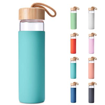 China Wholesale Customized Viable Lid 600ml Silicone Cover Glass Bamboo Water Bottle With Straw for sale