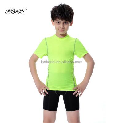 China Base Layer Breathable Wholesale Quick Dry Kids Compression Shirt Boys Short Sleeve Compression Shirt for sale