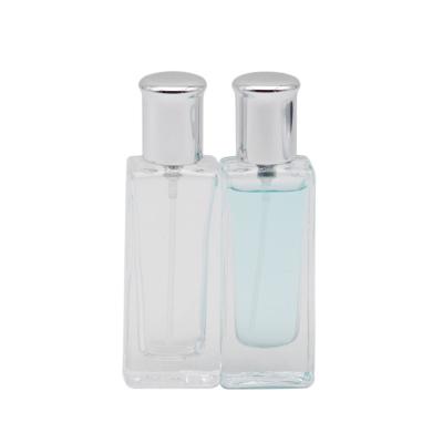 China Personal Care Square Spray Perfume Bottle Packaging Glass Bottle 50ml Clear Perfume Bottles For Sale for sale