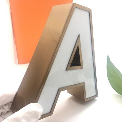 China Custom Buildings Backlight Stainless Steel 3D Letter Logo LED Outdoor Advertising Light Sign for sale