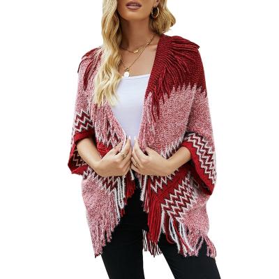 China Anti-wrinkle v-neck sweater elegant winter knitted towel caps shawl poncho cardigan sweater coat with tassels for women for sale