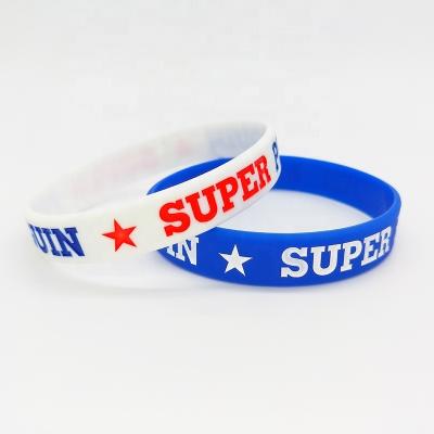 China All Personalized  For  Youth Balls Sports Team Ink Injected Silicone Wristband Custom Logo debossed fill  Rubber Bracelet for sale