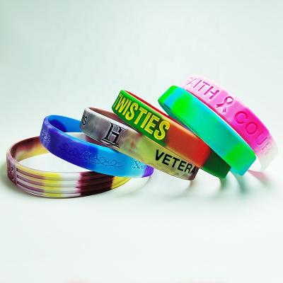 China All Rubber bracelet Ink Injected debossed fill print embossed glow Custom Logo Mixed colors swriled Silicone Wristband for sale