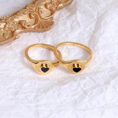 China 18K Gold Luxury Titanium Oil Water Resistant Index Ring For Women Jewelry Plated 18K Gold Steel Heart Shaped Ring for sale