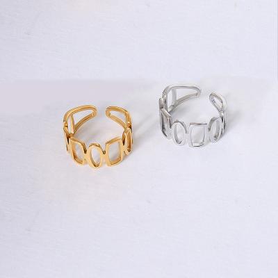 China Hot Simple Hollow Geometric Opening Ring Titanium Steel Plate 18K Central Institute of Statistics Water Resistant Personality Oval Chain Women Rings for sale