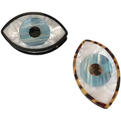 China 2021 Hot Selling Popular Environmentally Friendly Big Eyes Acetate Hair Cuts Evil Eye Hair Claw Cuts Fashionable Wacky Women Girls Hair Accessories for sale