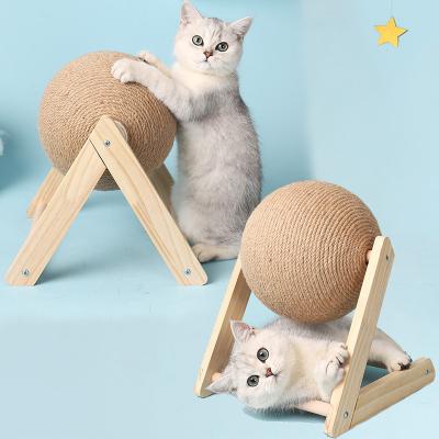 China Juguete de pelota de rascado para gatos de madera Sisal tablero de pelota de cuerda Juguete de pie triturador para gatos y muebles para mascotas en venta