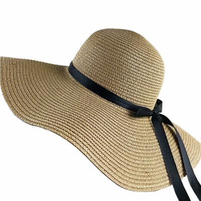 China Fashion Lady Big Brim Floppy Bowknot Straw Hat Summer Beach Hat Sun Foldable Paper Hat for sale