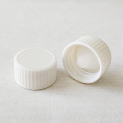 China Non Spill Urea Cap Cone Lined Caps For 1oz, 2 oz Boston Bottles for sale