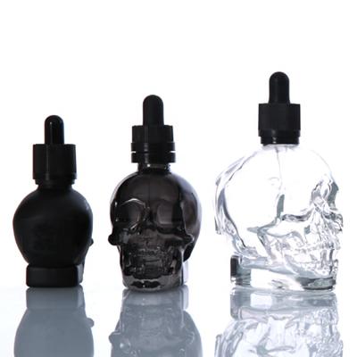 China Metal Gold Aluminum Rubber Cap+Glass Pipette+Silicone Collar Spray Bottles 1oz 2oz 120ml Perfume Beard Oil 30ml 60ml Small Clear Color Frosted Shaped Skull Glass Dropper Bottle by black color for sale