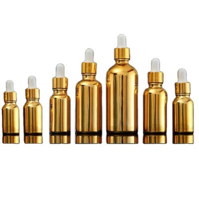 China Wholesale Cosmetic Gold Rubber Push Button Necklace Luxury Gold Cap+Glass Pipette+Silicone Serum Glass Eye Bottles With 100ml Dropper Dropper Bottles Glass For Essential Oil for sale