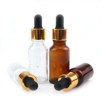 China Best Quality 2021 Hot Sale Aluminum Rubber Collar Cap+Glass Pipette+Silicone Gold Metal 10ml Amber Crystal Perfume Bottles For Essential Oil 20ml Clear Bottle Dropper oils bases gold for sale