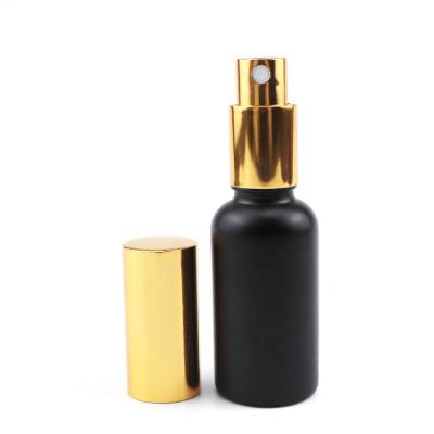 China Quality Empty Colored Cosmetic Sprayer Pump 1oz Container 30ml Crystal Perfume Rounded Colored Black Bottles 30ml Spray Glass Bottles for sale