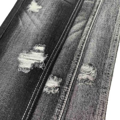 China Wrinkle Resistant 10.5oz Black Twill 100% Cotton Woven Non-Woven Hot Denim Fabric for sale