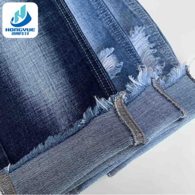 China Wrinkle Resistant 11.8oz Non-stretch Denim Fabric 100% Denim Fabric Dark Blue Cotton Lot for sale