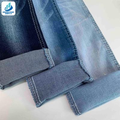 China Good Quality Blue Stretch 9.0oz TR Double Core Stretch Woven Denim Fabric for sale