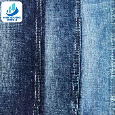 China 9.1oz Blue Denim Fabric Tear-Resistant Stretch Yarn-Dyed Woven Cotton Spandex Denim Fabric for sale