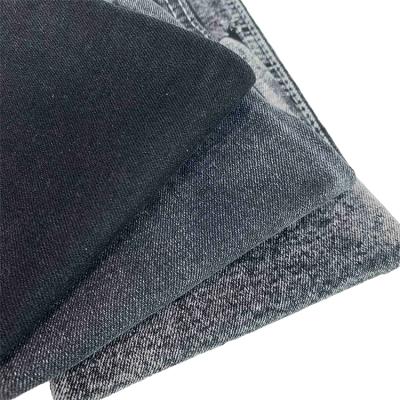 China 11.2oz Hand Wrinkle Resistant Black Soft Omfort Super Jeans Fabric Black Denim Fabric For Man for sale