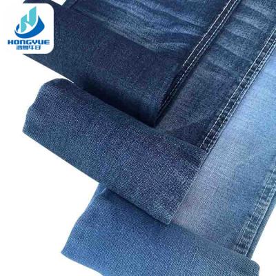 China 10.5oz Woven Jeans Fabric Stocklot Blue Premium Stretch Bonded Wrinkle Resistant Denim Fabric Mill For Jeans for sale