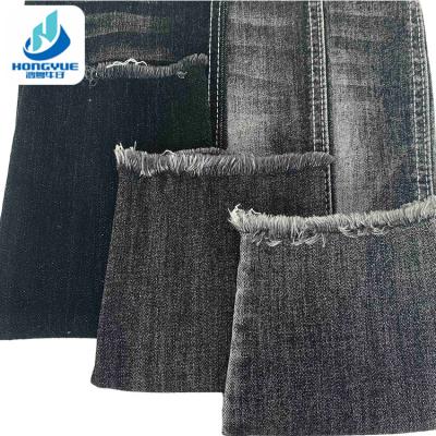 China Black 73% Cotton Stretch 10.5oz 20.3% Polyester Jeans Bulk Denim Fabric Wholesale for sale