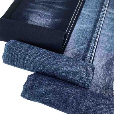 China Blue Gray Stretch Denim Jeans Fabric Suppliers Premium 10oz 71% Cotton Denim Fabric Mill Tear-Resistant for sale