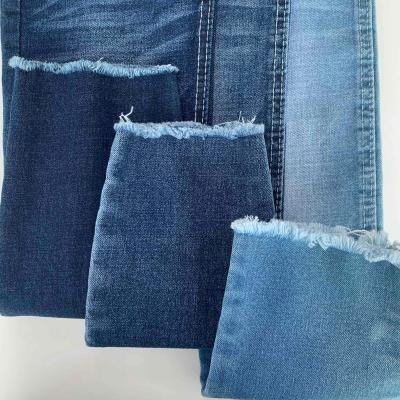 China Wholesale Breathable 10.5oz Good Running Lot Woven Stretch Blue Denim Fabric Jeans for sale